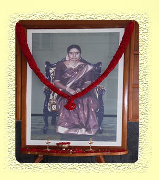 Portrait of late Tmt. Vijayalakshmi, garlanded