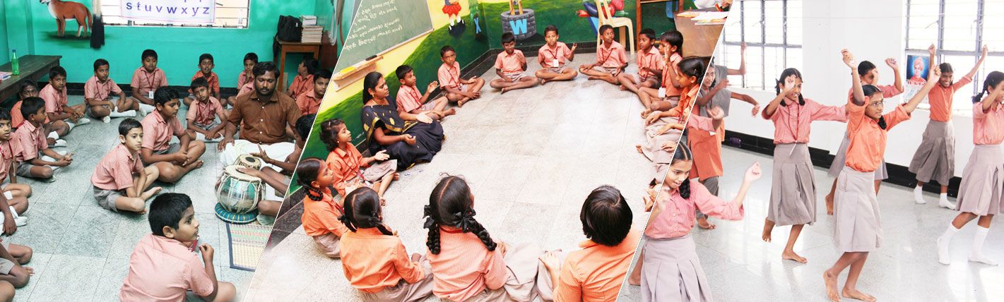 Children at a music and dance activity in the school hall