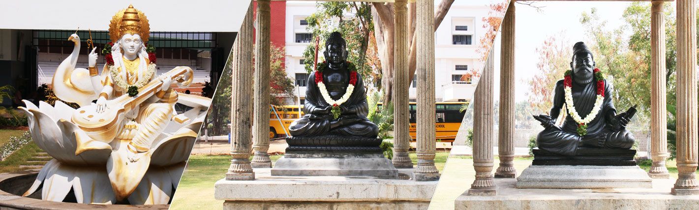 Statues of Saraswati and saints in the school garden